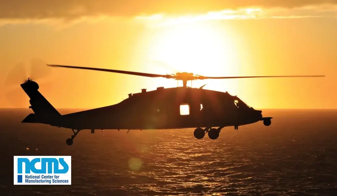 Helicopter over an open body of water and sunrise